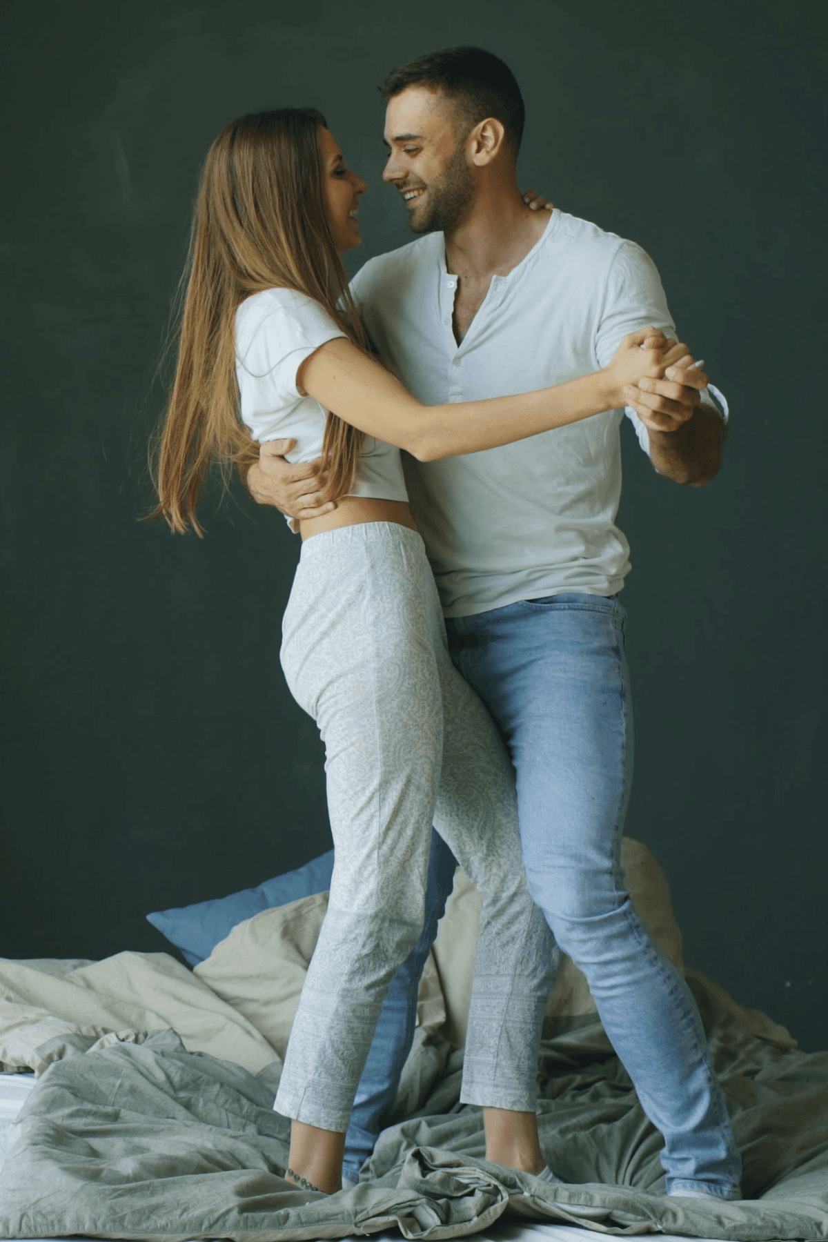 Couple practicing partner dance together at Dance Journey Studios