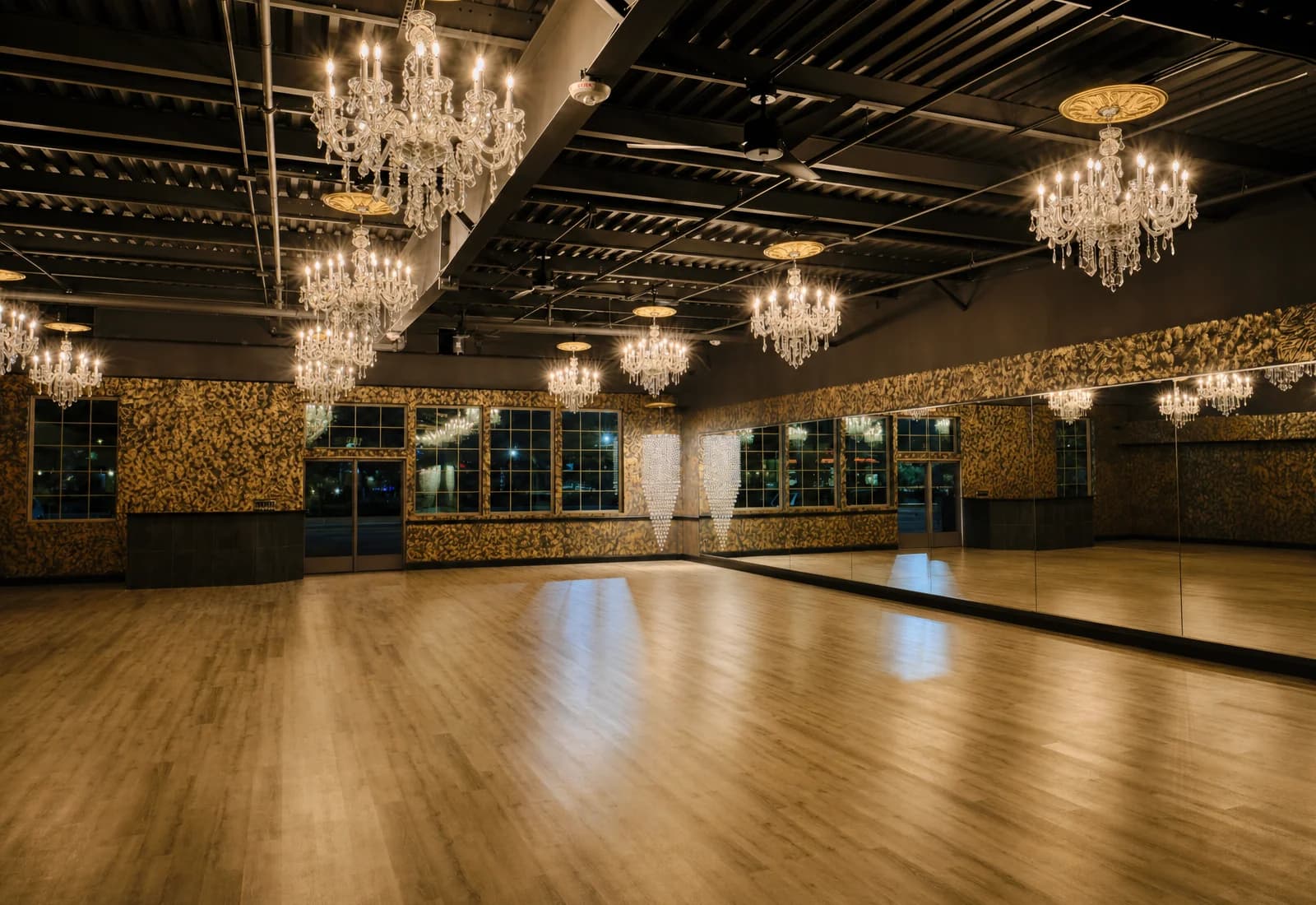 Luxury dance studio rental space with crystal chandeliers and mirrors